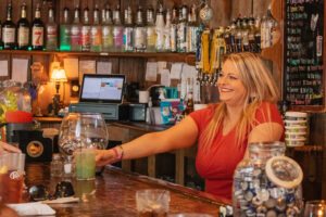 bartender serving drinks at The Lake House